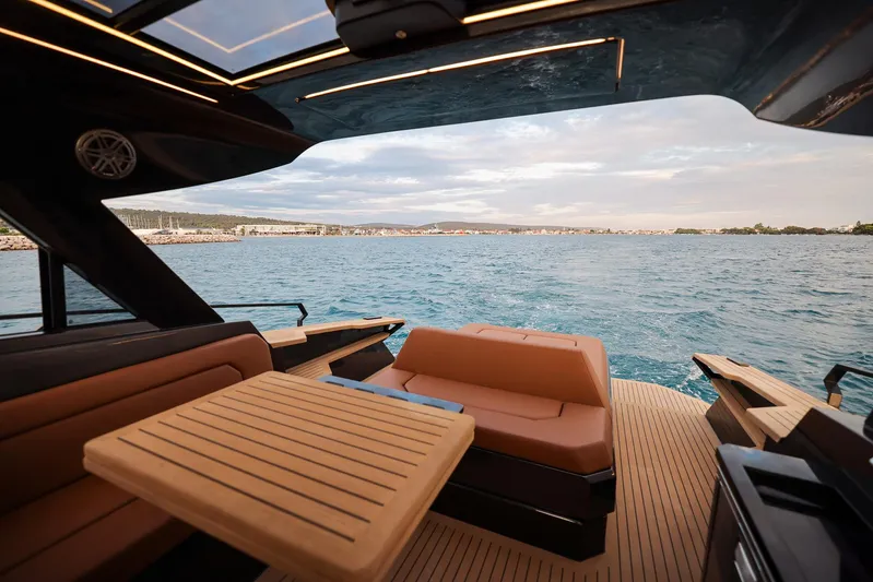  Yacht Photos Pics Luxurious interior of 2025 Focus 3X yacht with ocean view and elegant seating.