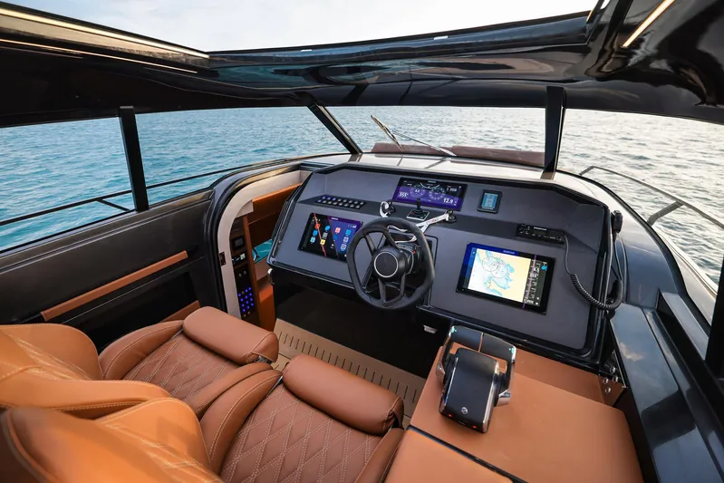  Yacht Photos Pics Luxurious 2025 Focus 3X yacht cockpit with advanced navigation systems and leather seating.