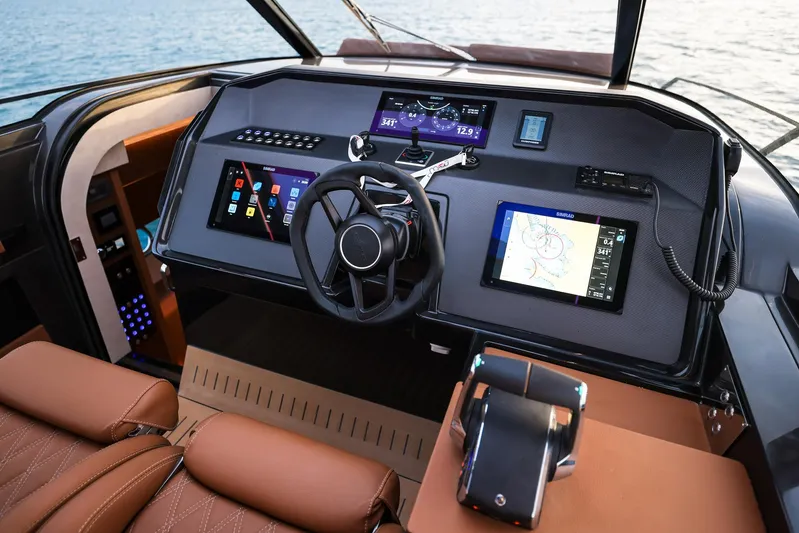  Yacht Photos Pics Luxurious 2025 Focus 3X yacht cockpit with advanced navigation and control systems.