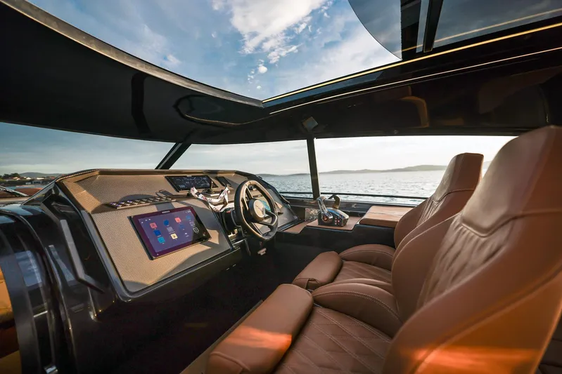  Yacht Photos Pics Luxurious 2025 Focus 3X yacht interior with leather seats and advanced dashboard technology.