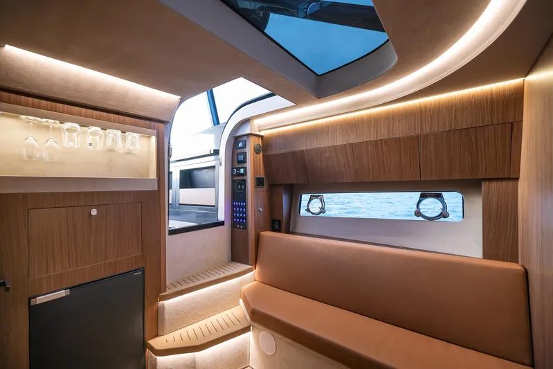  Yacht Photos Pics Luxurious interior of 2025 Focus 3X yacht with modern wood finishes and ambient lighting.