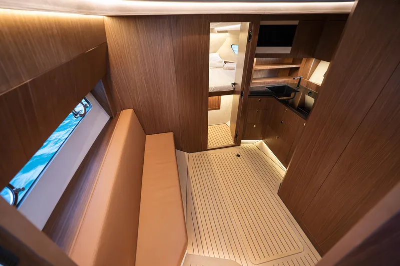  Yacht Photos Pics Luxurious interior of 2025 Focus 3X yacht with wood finish and modern amenities.