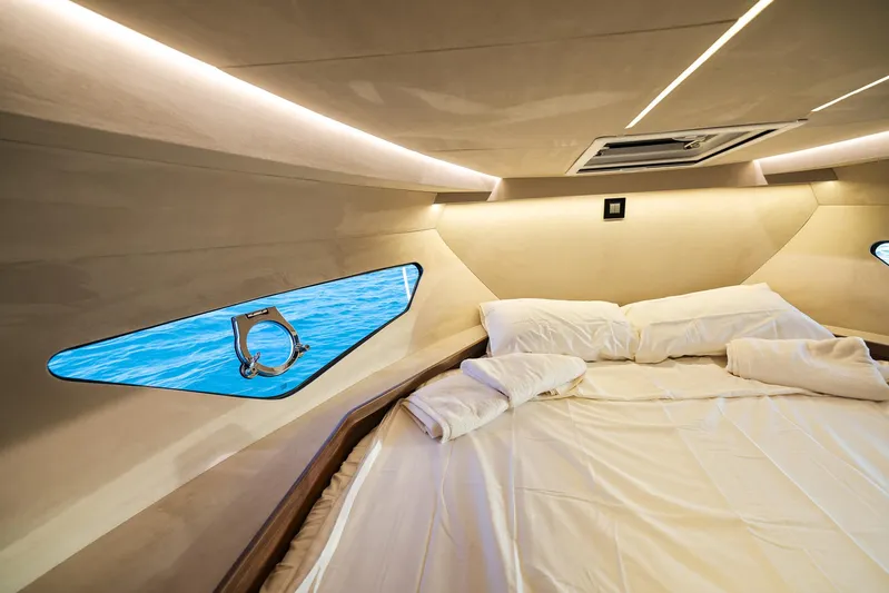  Yacht Photos Pics Luxurious cabin interior of 2025 Focus 3X yacht with ocean view through window.