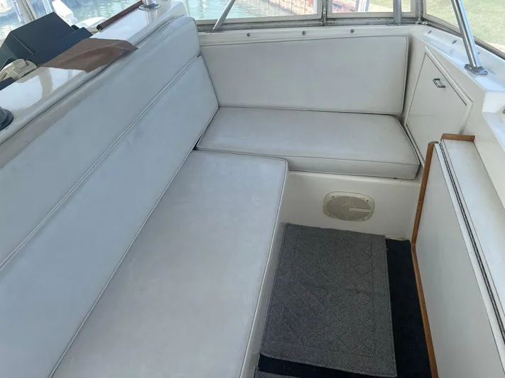 Seclusion Yacht Photos Pics Interior seating area of 1988 Ocean Yachts 55 Super Sport boat.