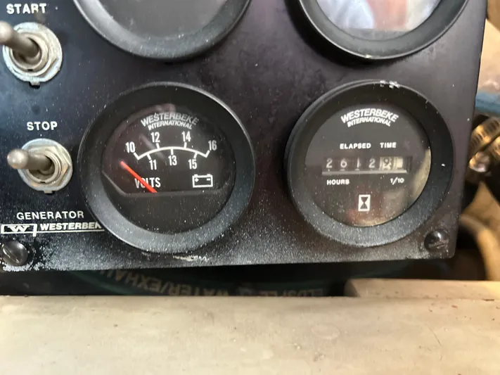 Seclusion Yacht Photos Pics Control panel of 1988 Ocean Yachts 55 Super Sport with Westerbeke generator gauges.