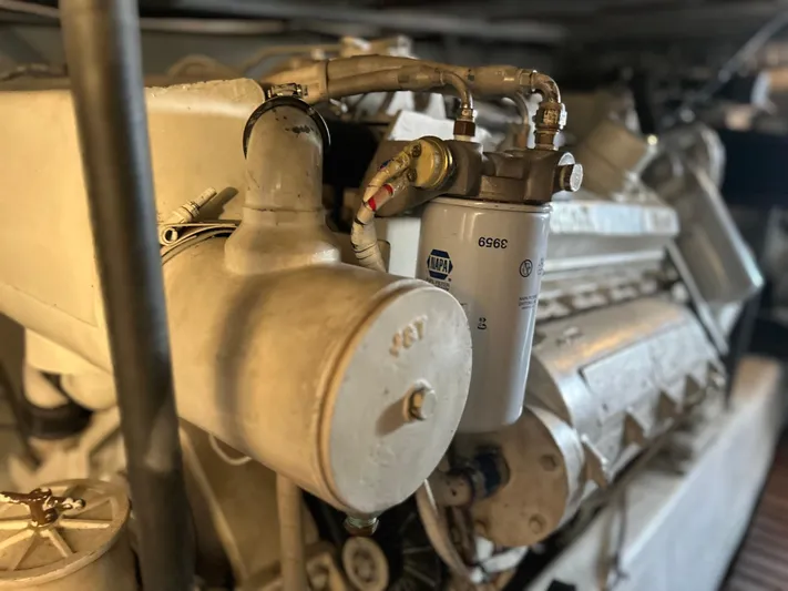 Seclusion Yacht Photos Pics Engine room of 1988 Ocean Yachts 55 Super Sport, featuring detailed mechanical components.