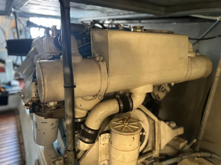 Seclusion Yacht Photos Pics Engine room of 1988 Ocean Yachts 55 Super Sport, showcasing detailed mechanical components.