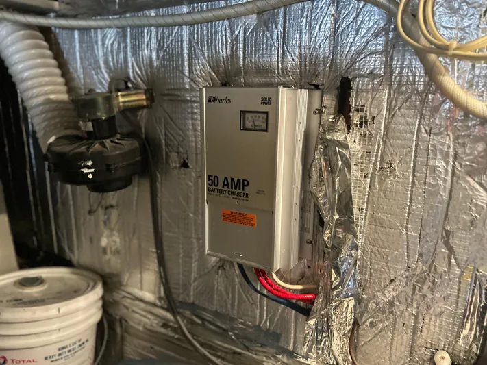 Seclusion Yacht Photos Pics 50 AMP battery charger in 1988 Ocean Yachts 55 Super Sport engine room.