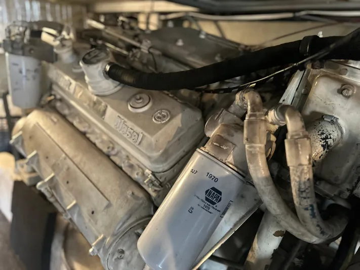 Seclusion Yacht Photos Pics Engine of a 1988 Ocean Yachts 55 Super Sport, showcasing detailed mechanical components.