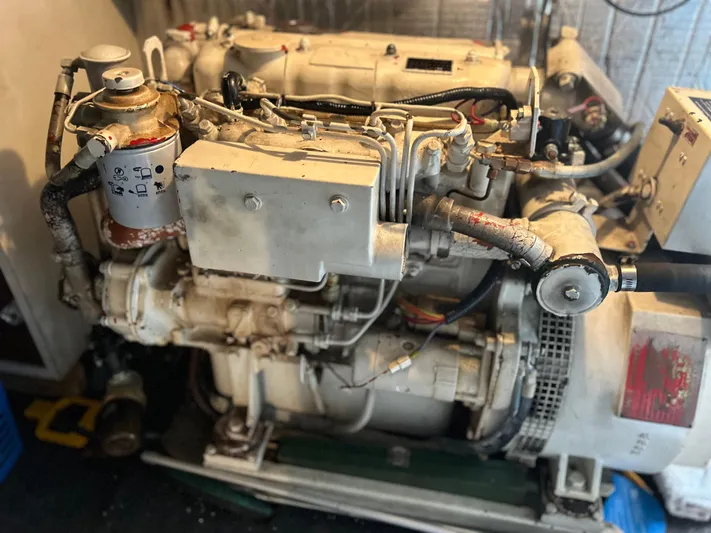 Seclusion Yacht Photos Pics Engine of a 1988 Ocean Yachts 55 Super Sport, showcasing mechanical components.