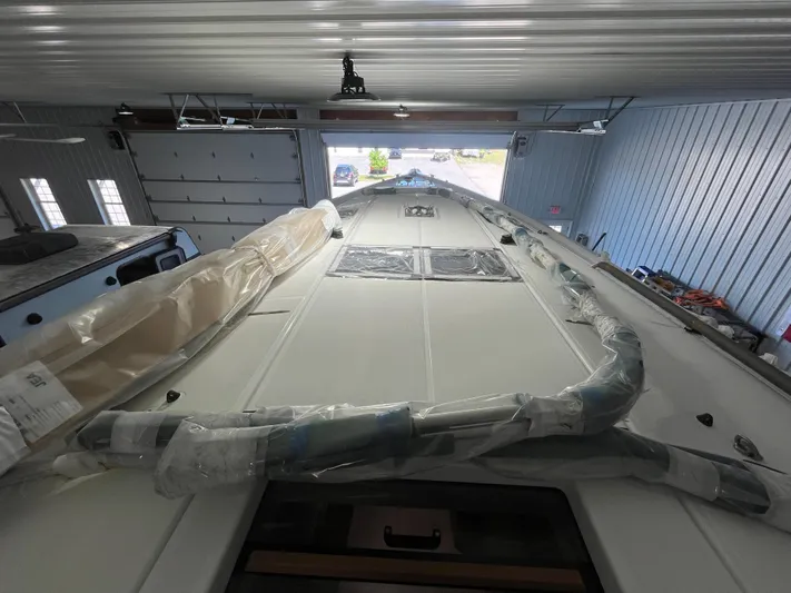  Yacht Photos Pics 2024 Jeanneau Sun Odyssey 440 yacht in storage, wrapped and ready for transport.