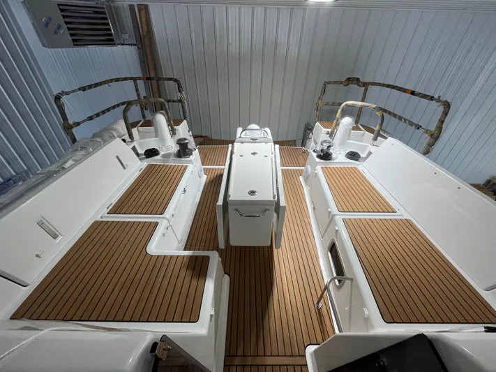  Yacht Photos Pics 2024 Jeanneau Sun Odyssey 440 yacht cockpit with teak flooring and modern design.