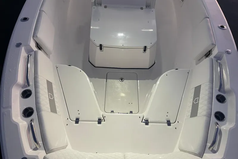  Yacht Photos Pics 2026 Sea Fox 268 Commander boat interior with cushioned seating and storage compartments.
