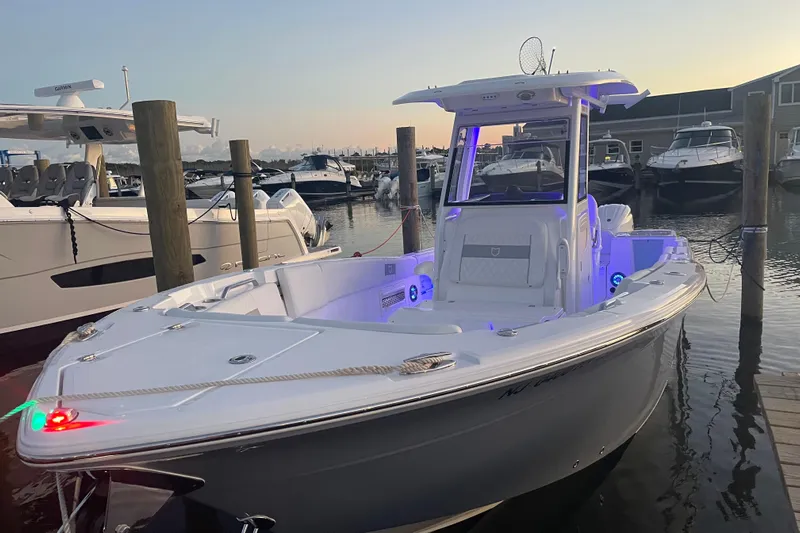  Yacht Photos Pics 2026 Sea Fox 268 Commander boat docked at marina during sunset.