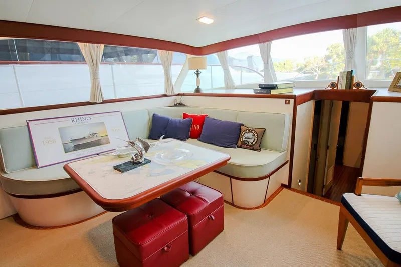 Rhino Yacht Photos Pics Interior of a 1958 Rybovich 54 Yachtfish with elegant seating and decor.
