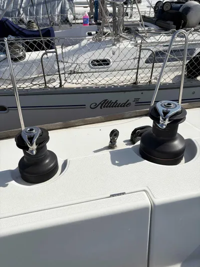 Brown Sugar Yacht Photos Pics Winches on 2005 Beneteau First 47.7 sailboat deck, docked at marina.