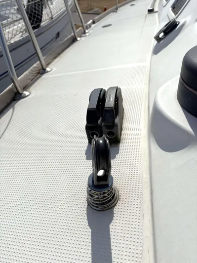 Brown Sugar Yacht Photos Pics Deck of 2005 Beneteau First 47.7 sailboat with cleats and winch.