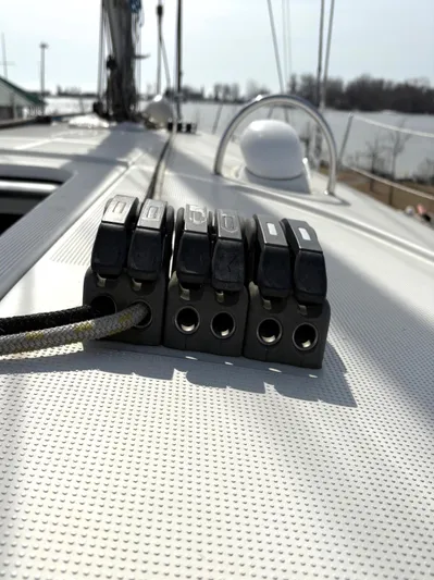 Brown Sugar Yacht Photos Pics Deck of 2005 Beneteau First 47.7 sailboat with rope clutches.