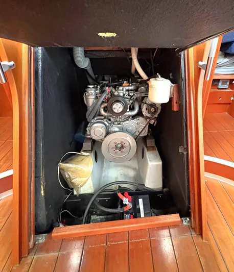 Brown Sugar Yacht Photos Pics Engine compartment of a 2005 Beneteau First 47.7 sailboat, showcasing mechanical components.