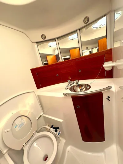 Brown Sugar Yacht Photos Pics Bathroom interior of 2005 Beneteau First 47.7 yacht with sink and toilet.