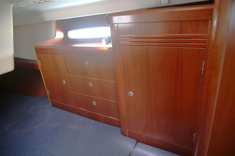 Brown Sugar Yacht Photos Pics Interior cabin of 2005 Beneteau First 47.7 yacht with wooden cabinetry.