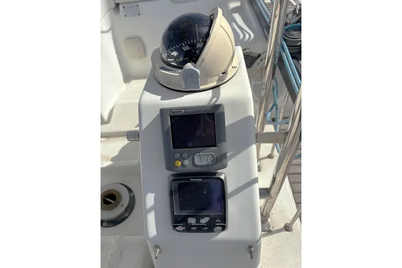 Brown Sugar Yacht Photos Pics Beneteau First 47.7 yacht cockpit with compass and navigation instruments, 2005 model.