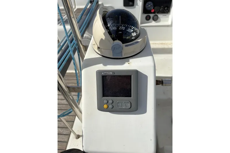 Brown Sugar Yacht Photos Pics Compass and navigation display on 2005 Beneteau First 47.7 yacht deck.