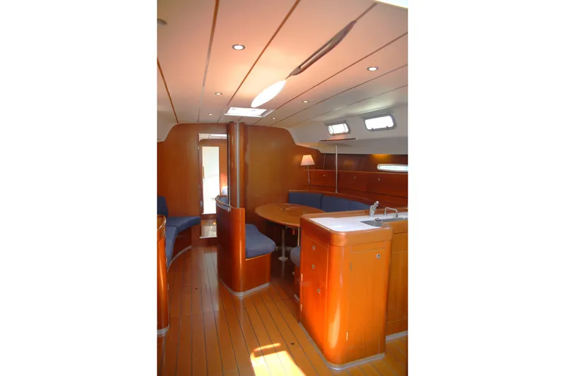 Brown Sugar Yacht Photos Pics Interior of 2005 Beneteau First 47.7 yacht, featuring wood finish and modern amenities.