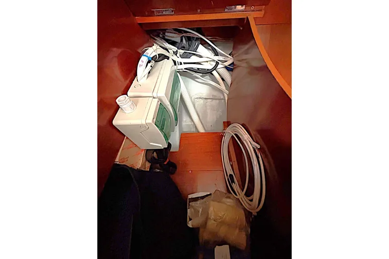 Brown Sugar Yacht Photos Pics Interior view of a 2005 Beneteau First 47.7 yacht showing electrical components and wiring.