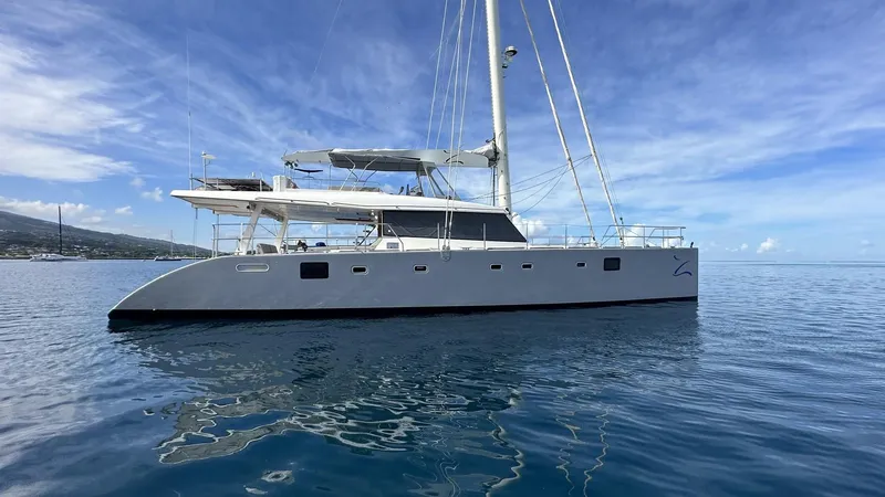 Zahora Yacht Photos Pics 2008 Sunreef 62 catamaran sailing on calm blue waters.