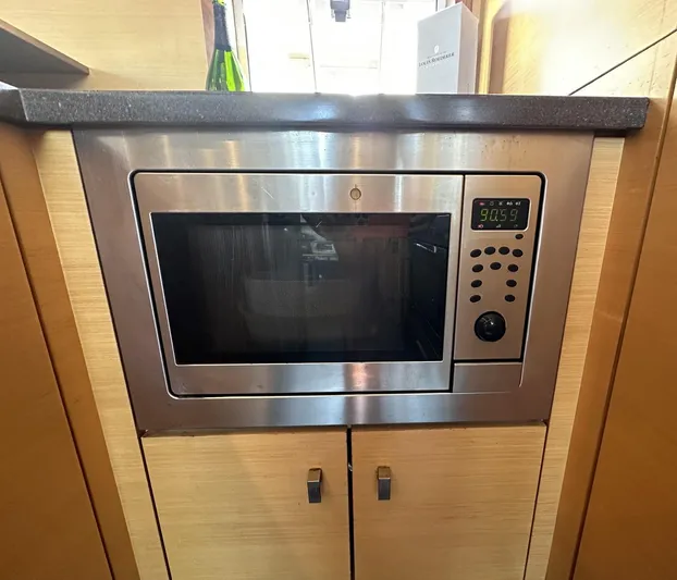 Zahora Yacht Photos Pics Built-in microwave in 2008 Sunreef 62 yacht kitchen.