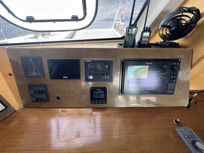 Zahora Yacht Photos Pics Navigation panel of 2008 Sunreef 62 yacht with electronic displays and communication devices.