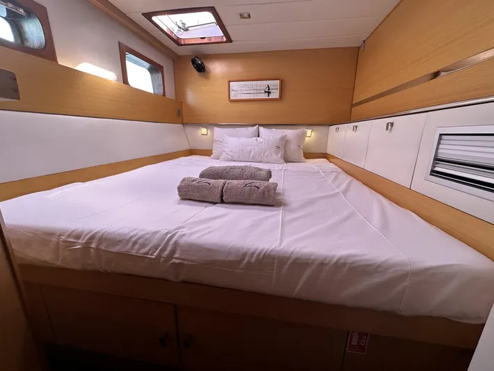 Zahora Yacht Photos Pics Luxurious cabin interior of 2008 Sunreef 62 yacht with cozy bed and natural lighting.