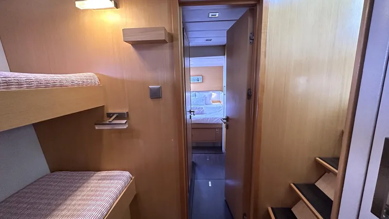 Zahora Yacht Photos Pics Interior of 2008 Sunreef 62 yacht with cozy cabin and wooden finishes.