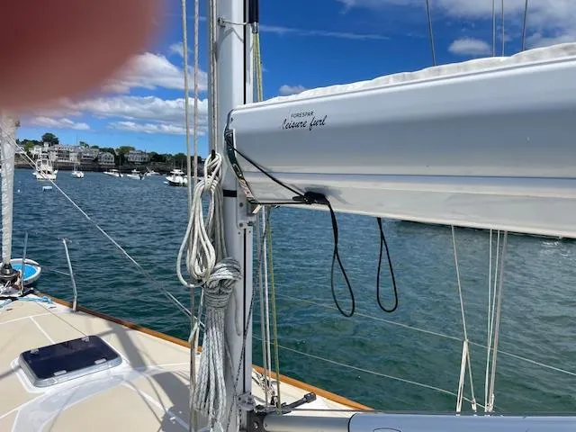 High C's Yacht Photos Pics Sailboat deck view with mast and rigging, Sabre Spirit 2012, on a sunny day.