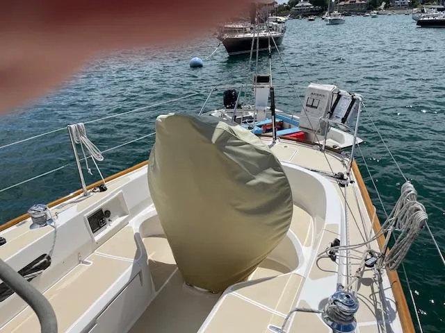 High C's Yacht Photos Pics Sailboat deck view, Sabre Spirit 2012, moored on a sunny day with covered equipment.