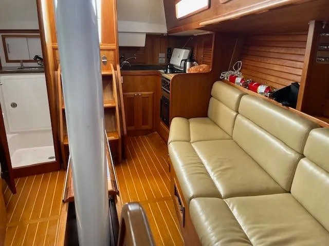 High C's Yacht Photos Pics Interior of 2012 Sabre Spirit yacht with leather seating and wooden finishes.