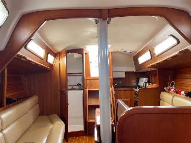 High C's Yacht Photos Pics Interior of 2012 Sabre Spirit sailboat with wood finish and cozy seating area.