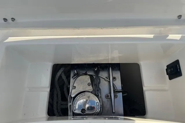  Yacht Photos Pics 2017 Regulator 25 boat anchor storage compartment with ropes and cleat.