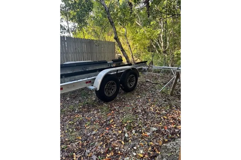  Yacht Photos Pics Trailer for 2017 Regulator 25 boat in wooded area.