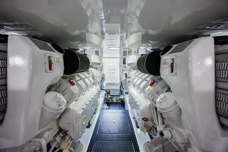 Insomnio Yacht Photos Pics Engine room of 2022 Viking 48 Convertible yacht, showcasing powerful dual engines.