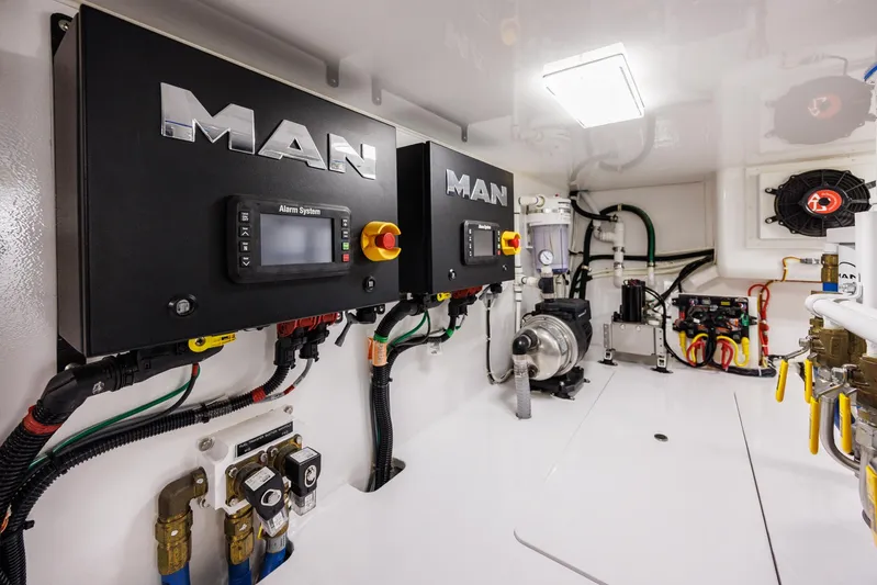 Insomnio Yacht Photos Pics Engine room of 2022 Viking 48 Convertible yacht with MAN control systems.