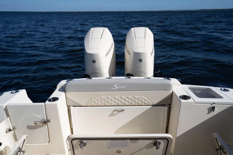 Natural 9 Yacht Photos Pics 2024 Scout 330 LXF boat with dual Mercury engines on open water.