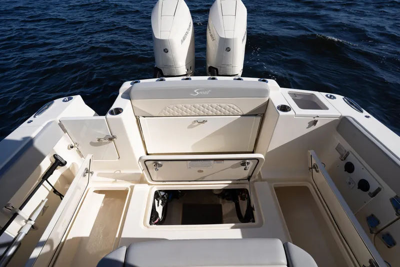 Natural 9 Yacht Photos Pics 2024 Scout 330 LXF boat deck with dual engines and storage compartments.