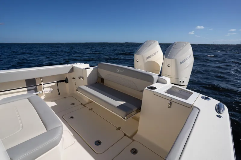 Natural 9 Yacht Photos Pics 2024 Scout 330 LXF boat with dual Mercury engines on open water.