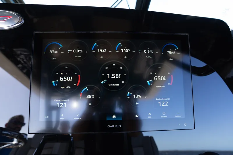 Natural 9 Yacht Photos Pics Dashboard display of 2024 Scout 330 LXF boat showing engine metrics and GPS speed.
