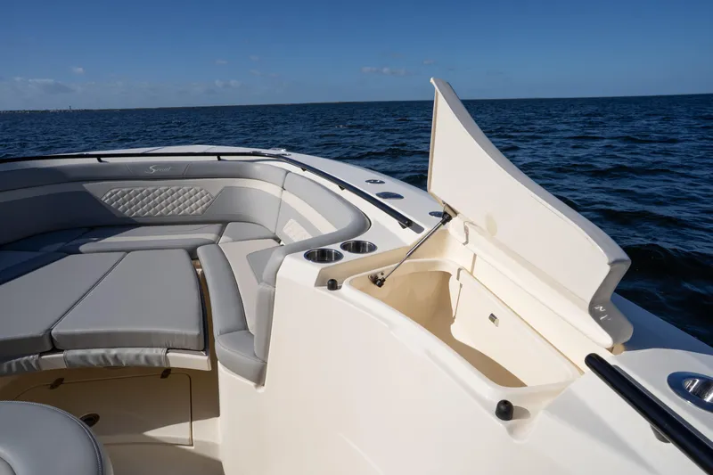 Natural 9 Yacht Photos Pics 2024 Scout 330 LXF boat interior with seating and storage, on open water.