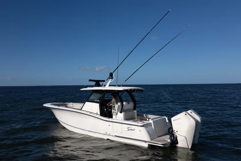 Natural 9 Yacht Photos Pics 2024 Scout 330 LXF boat on open water with dual Mercury engines.
