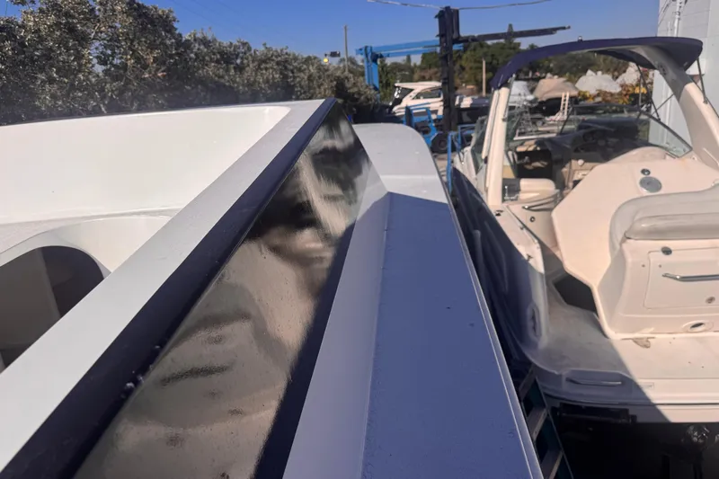  Yacht Photos Pics 2025 Don Smith Custom 55' yacht docked beside another boat.