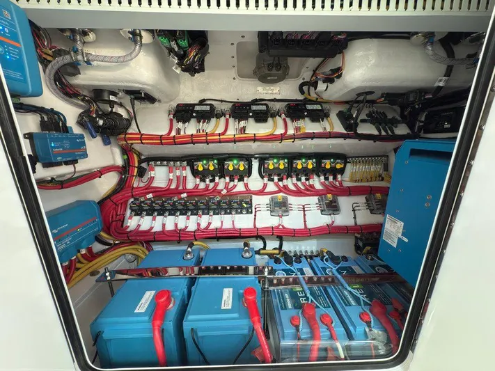  Yacht Photos Pics 2025 Mag Bay 38 CC electrical system with batteries and wiring.
